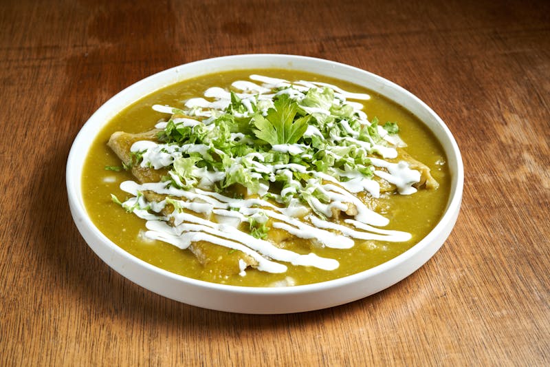 Beef enchiladas with red mole sauce